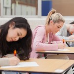 Students writing during an exam
